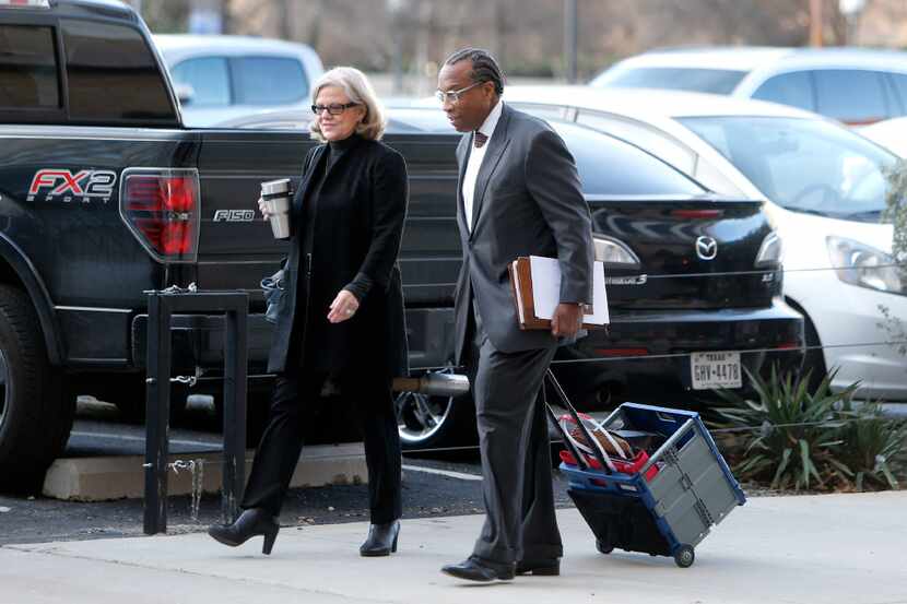 Dallas County Commissioner John Wiley Price arrives with his lawyer Shirley Baccus-Lobel for...