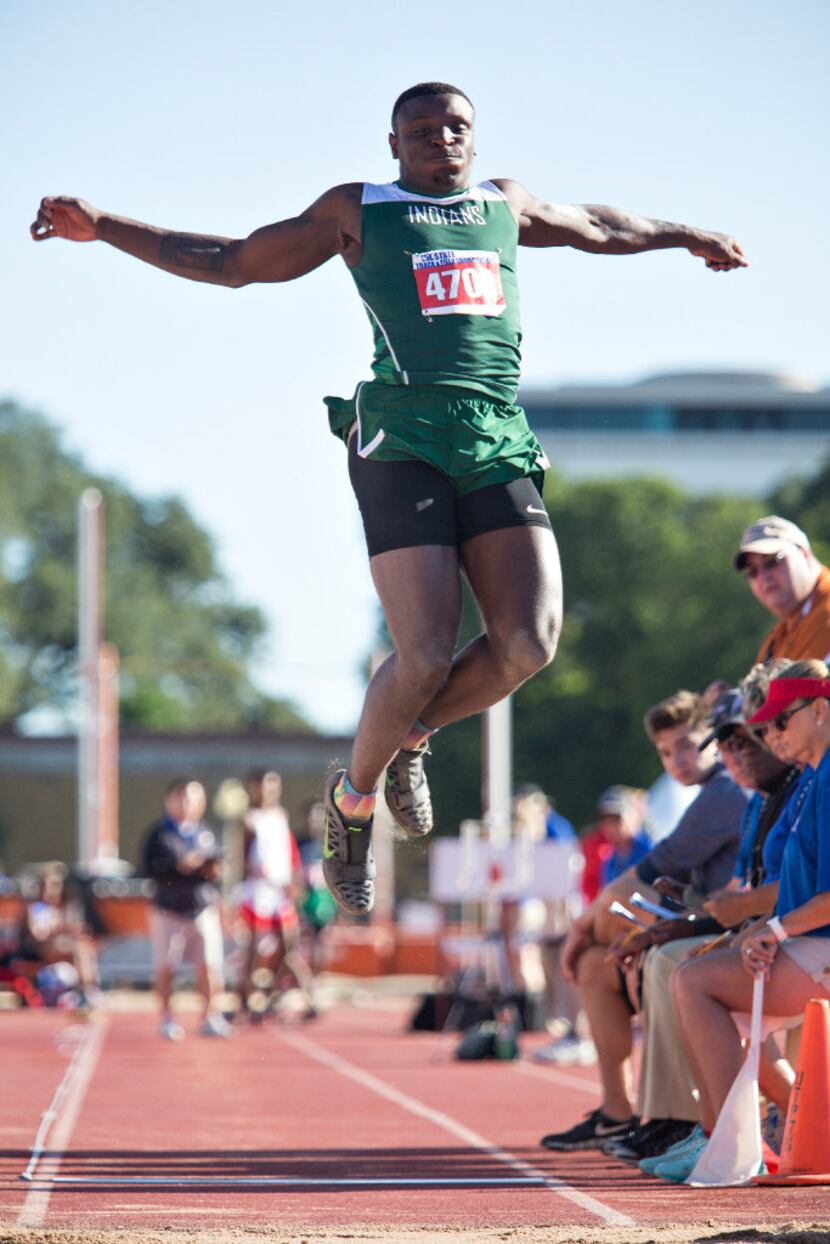 FILE - Waxahachie's Jalen Reagor (4709) takes a jump during the 5A Boys long jump during the...
