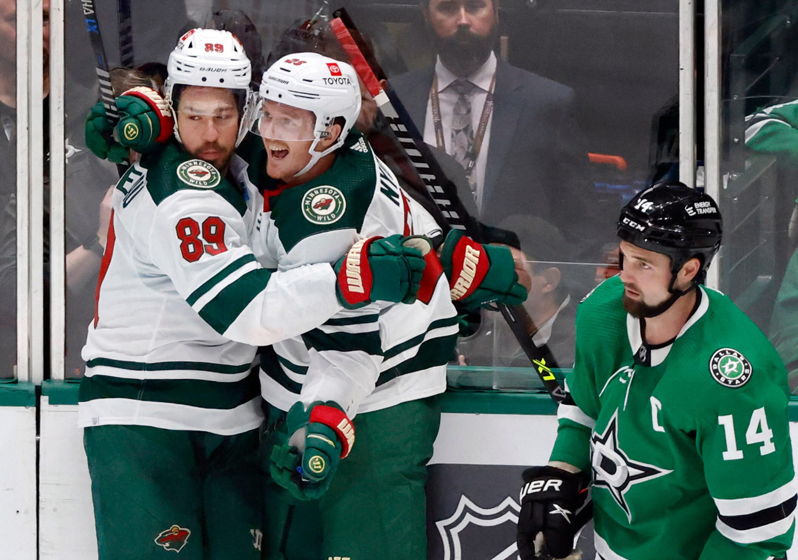 Minnesota Wild center Frederick Gaudreau (89) is congratulated on his second period goal by...