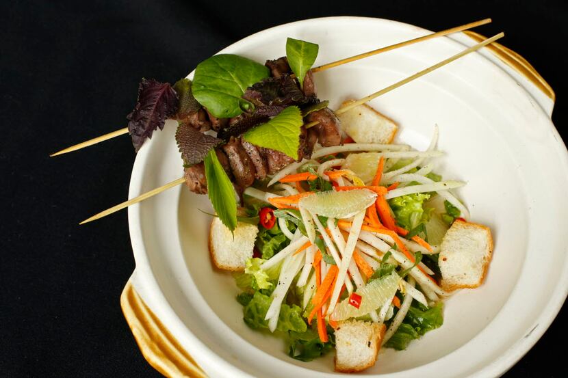 Grilled duck hearts with green papaya salad at Mot Hai Ba, the modern Vietnamese restaurant...