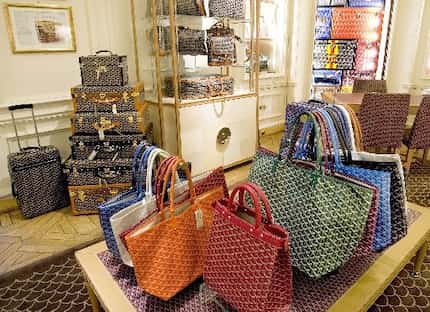 Goyard handbags on display in Bergdorf Goodman.