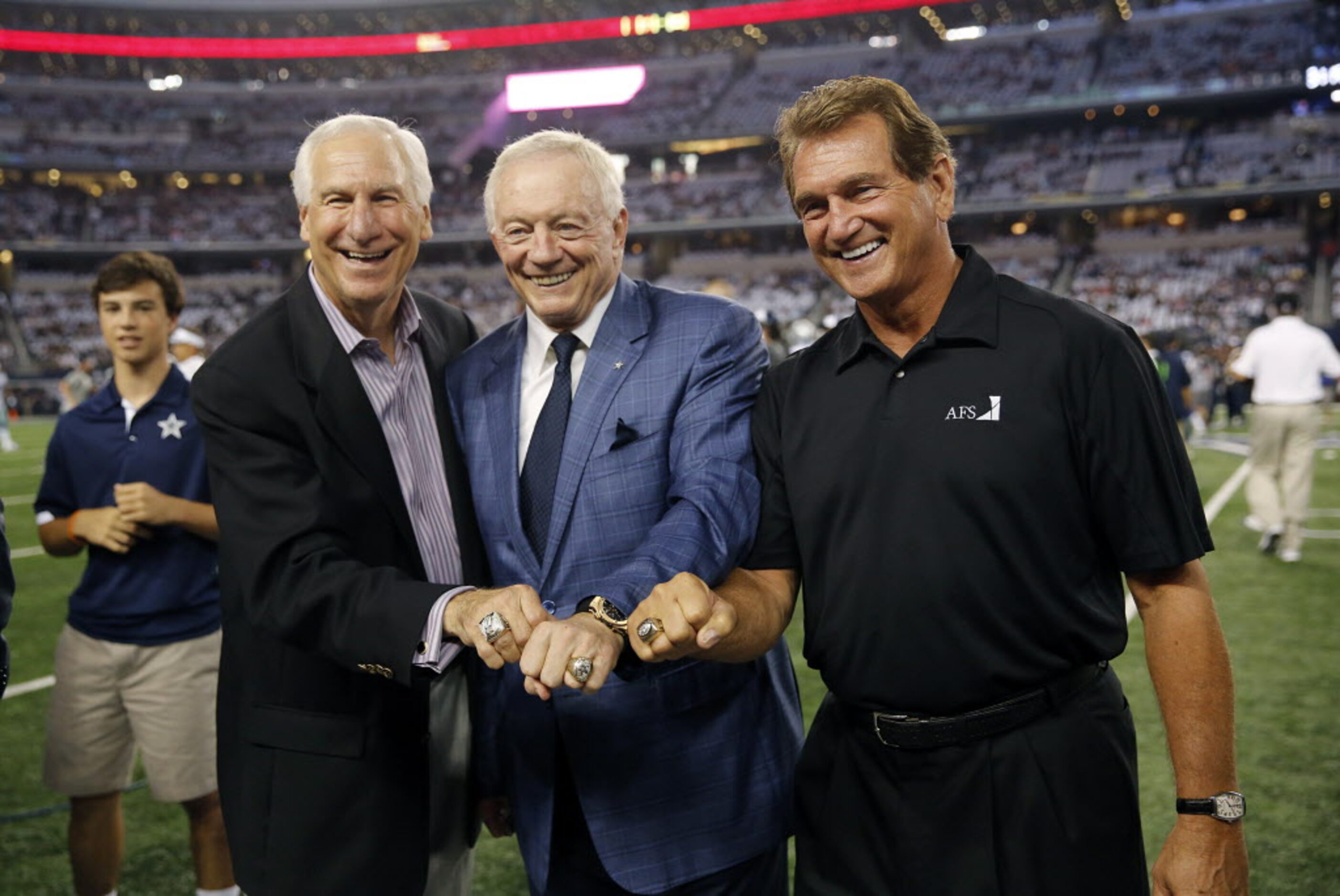 Dallas Cowboys owner Jerry Jones joins former Washington Redskins quarterback Joe Theismann...