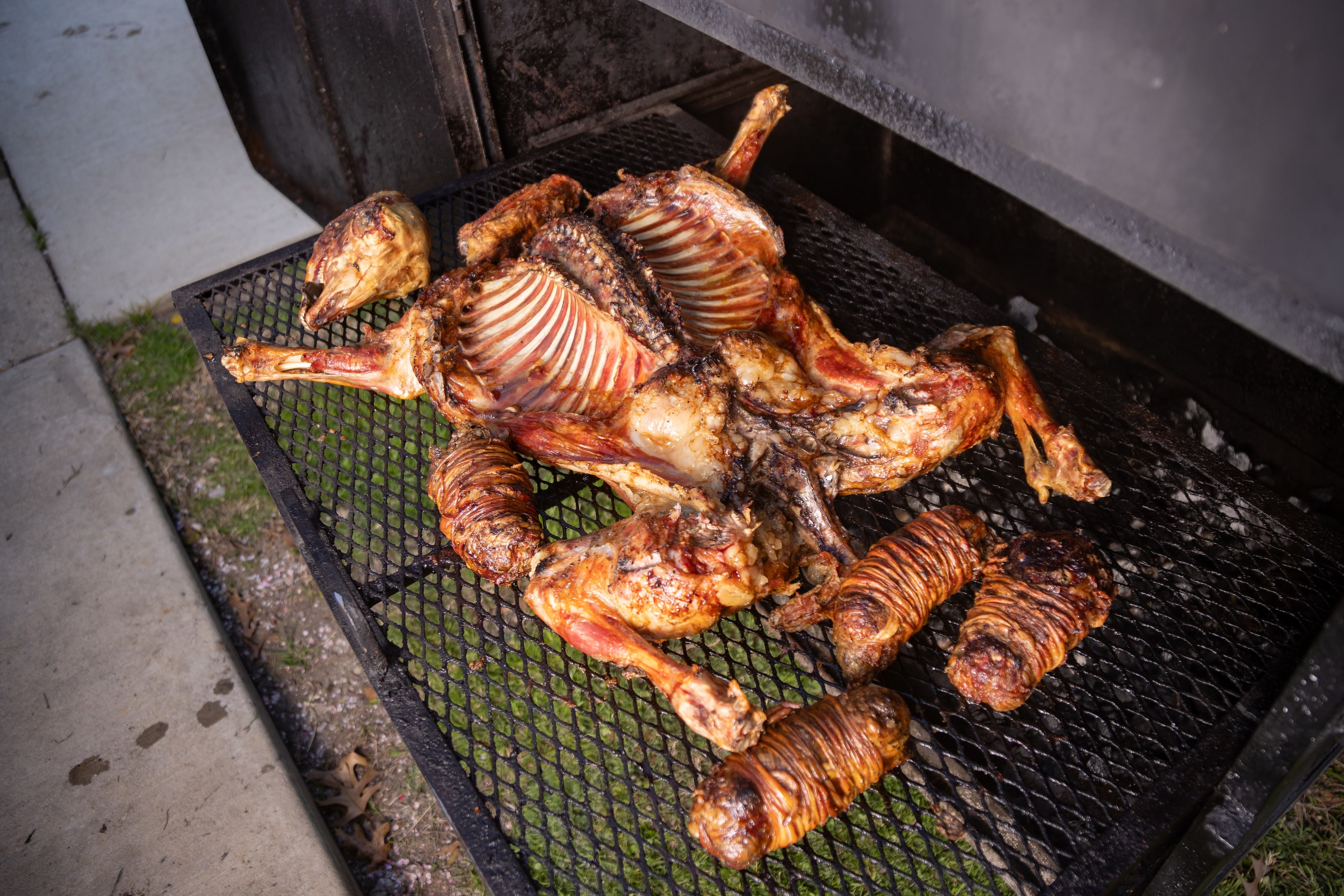 Montemayor, a native of Monterrey and owner of Tacos Lalo, finishes cooking cabrito al...