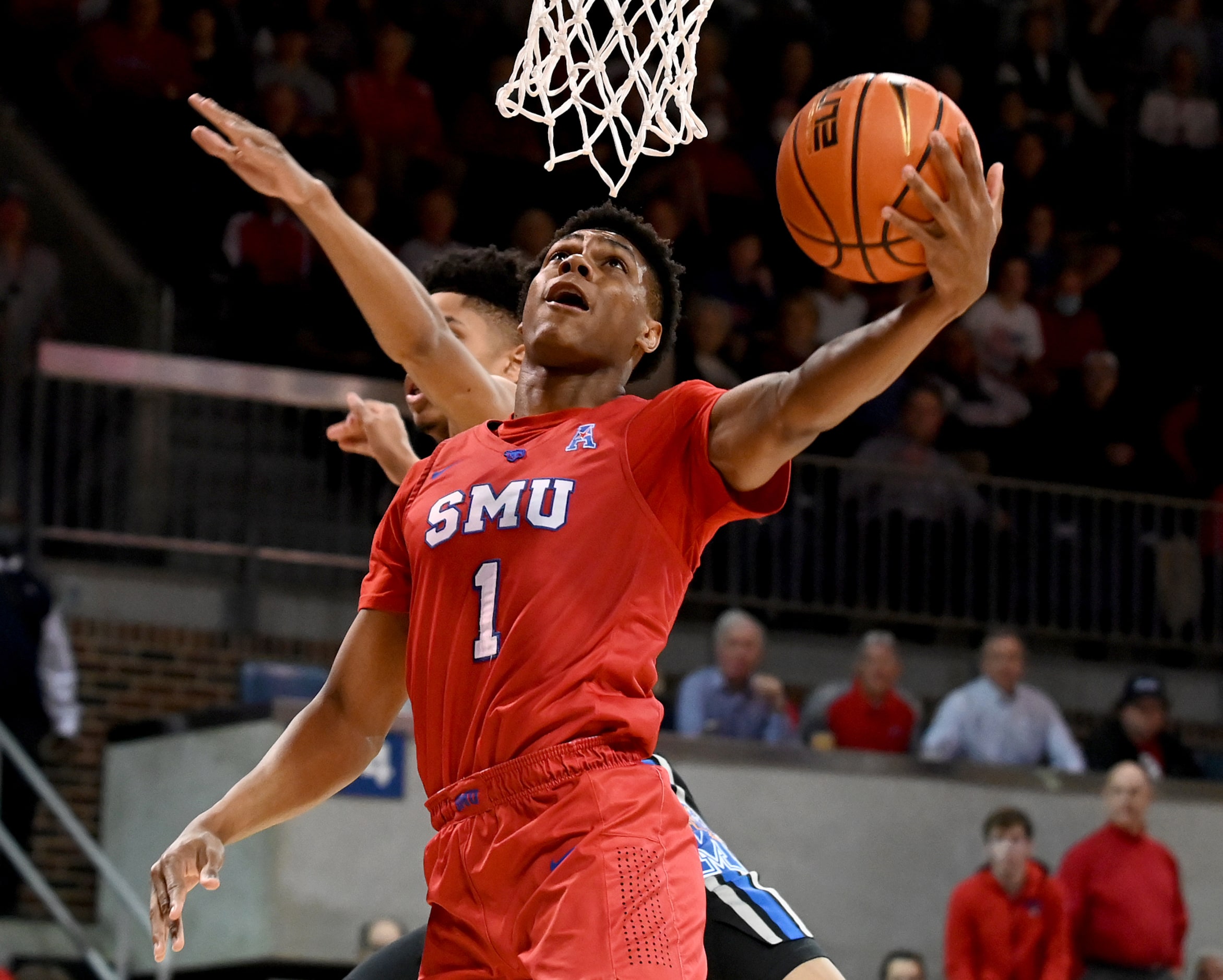 Memphis forward Emoni Bates (1) shoots in front of Memphis forward Josh Minott (20) in the...