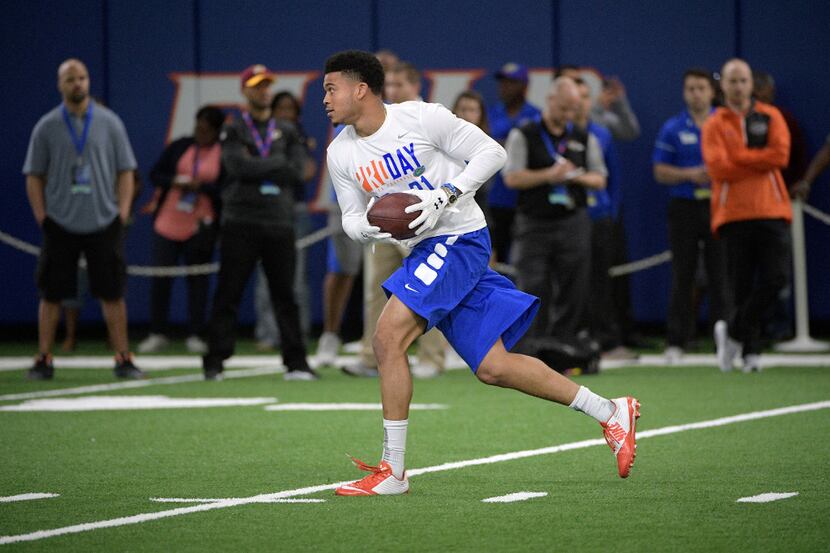 Defensive back Teez Tabor (31) runs through a drill during Florida's pro day in Gainesville,...