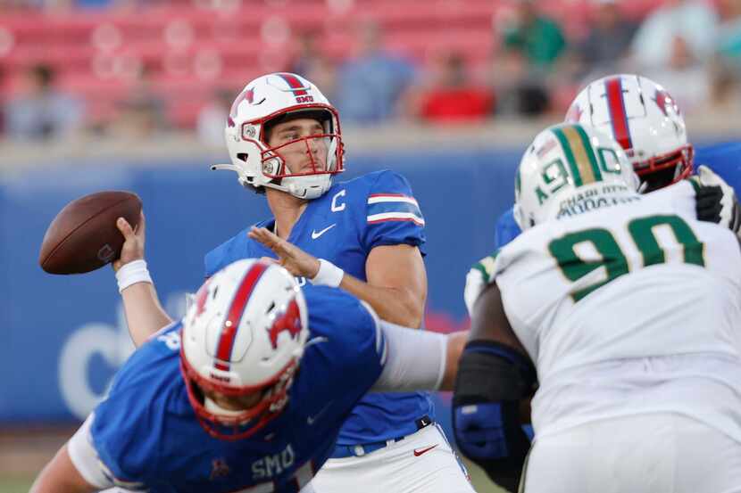 SMU quarterback Preston Stone (2) passes under pressure from Charlotte 49ers defensive...