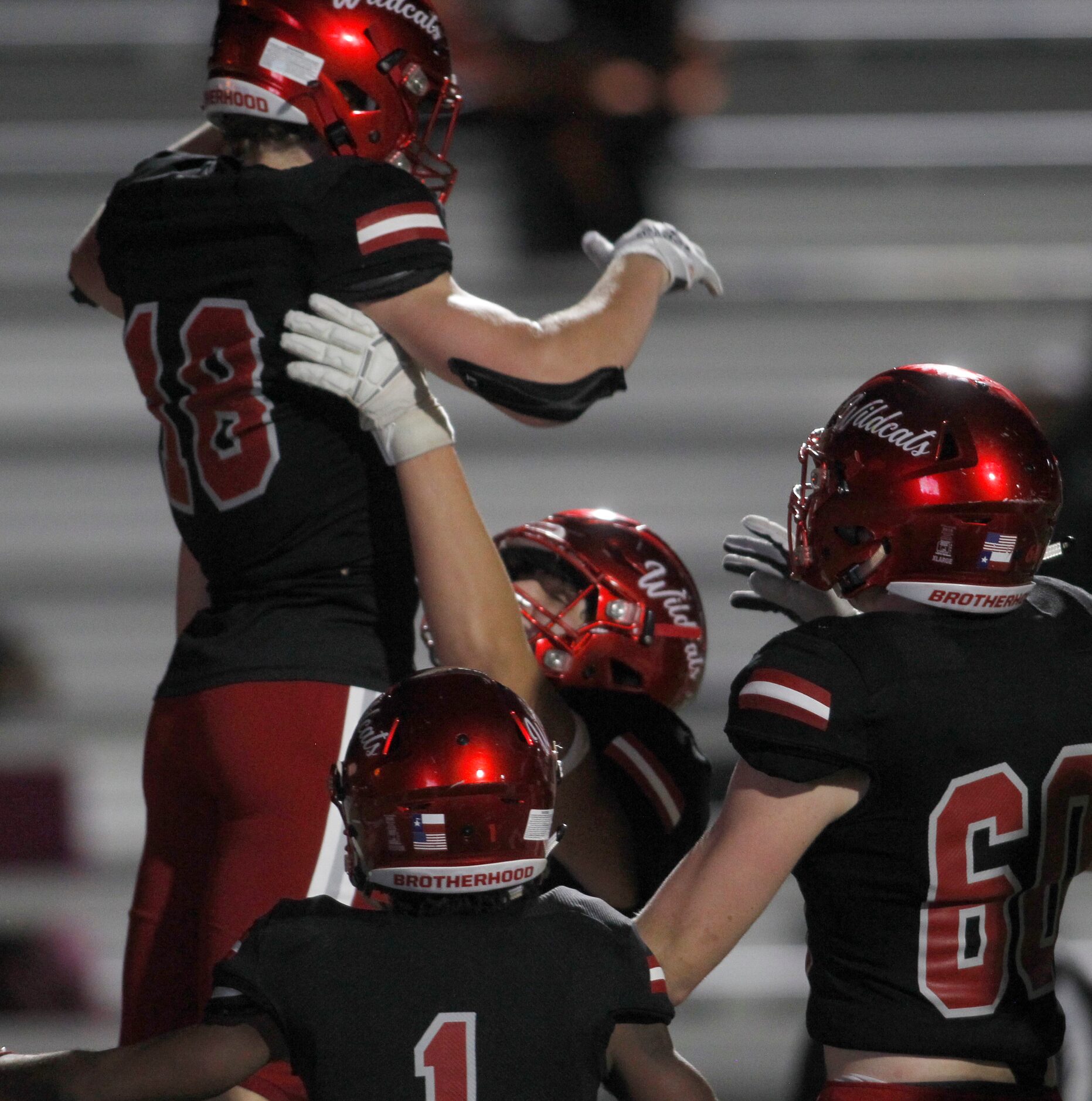 Dallas Woodrow Wilson receiver Graydon Thompson (18) is lifted in the air as he celebrates...