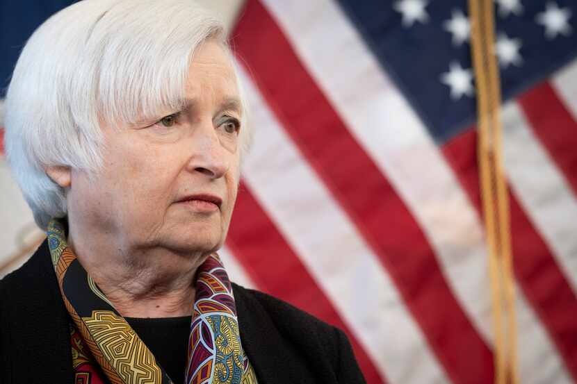 FILE - Treasury Secretary Janet Yellen speaks with reporters during a visit to the Virginia...