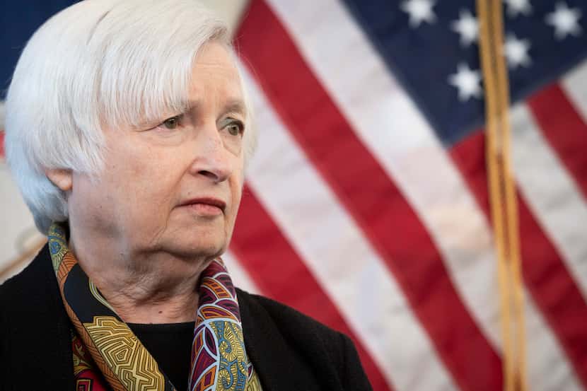 FILE - Treasury Secretary Janet Yellen speaks with reporters during a visit to the Virginia...