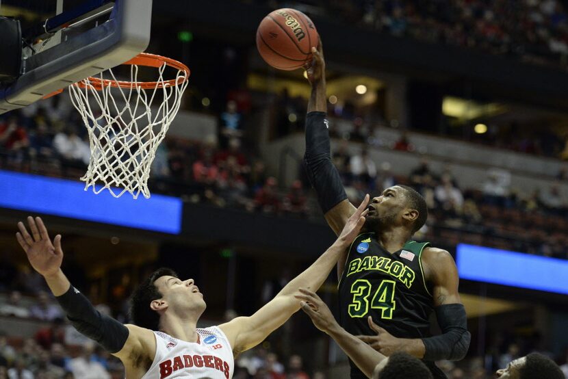 Baylor Bears forward Cory Jefferson (34) shoots the ball against Wisconsin Badgers forward...