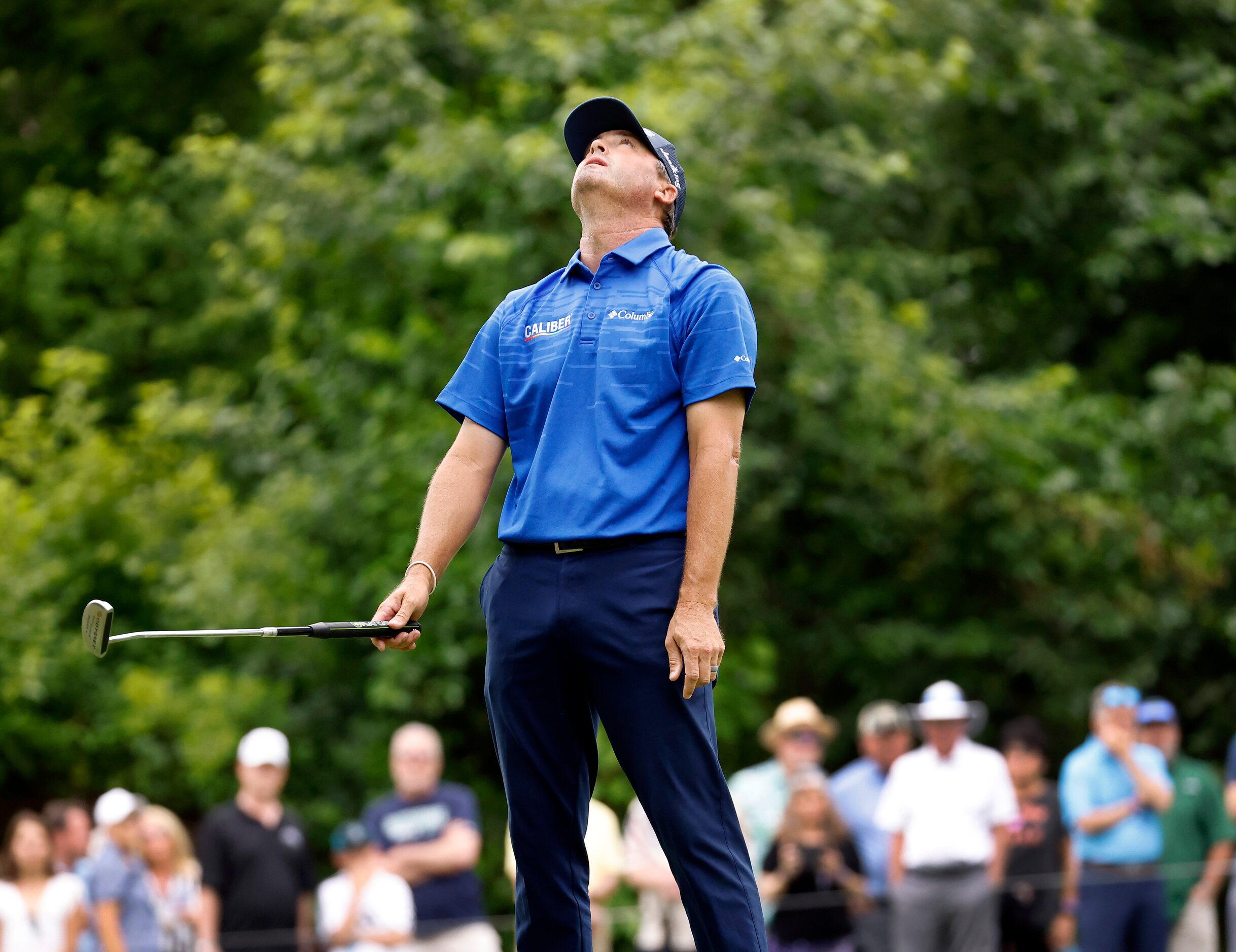 Professional golfer Ryan Palmer reacts after missing a birdie putt on the par-3, No. 8...