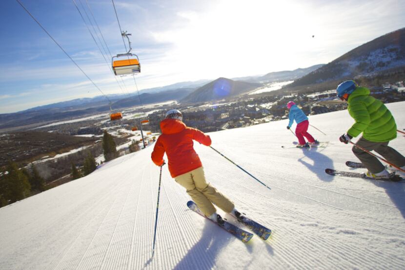 Park City, Utah - Canyons Resort -- Orange Bubble Express lifts skiers to world class...