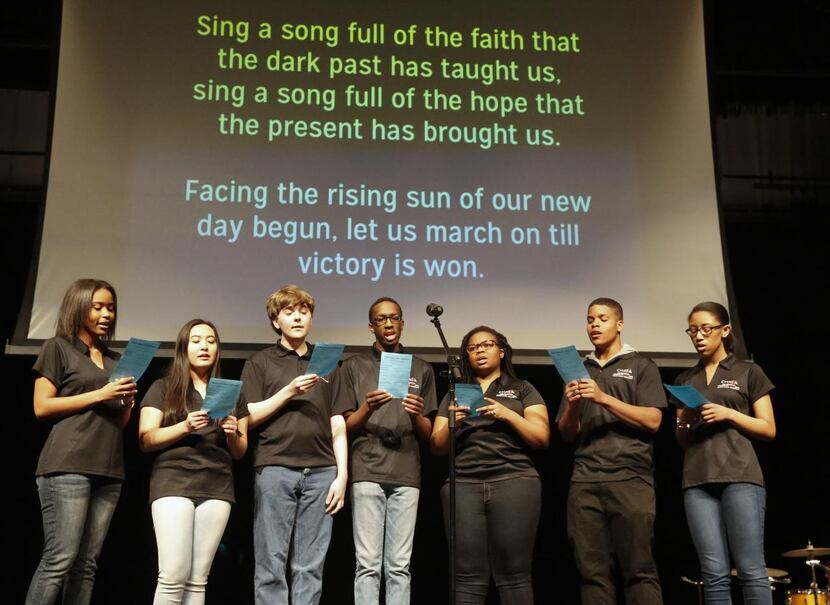 
Members of the Forte Vocal Choir at Cedar Hill High School sing “Lift Every Voice and Sing”...