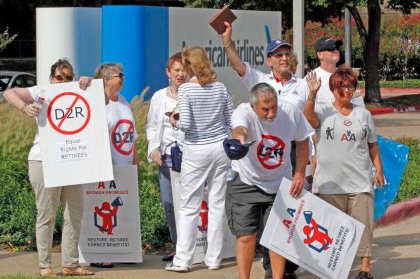 
Retired American Airlines  employees on Wednesday protested a planned change to their...