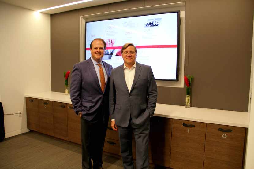 Ran Holman (left), managing principal of C&W's Dallas office, and Tod Lickerman, CEO of the...