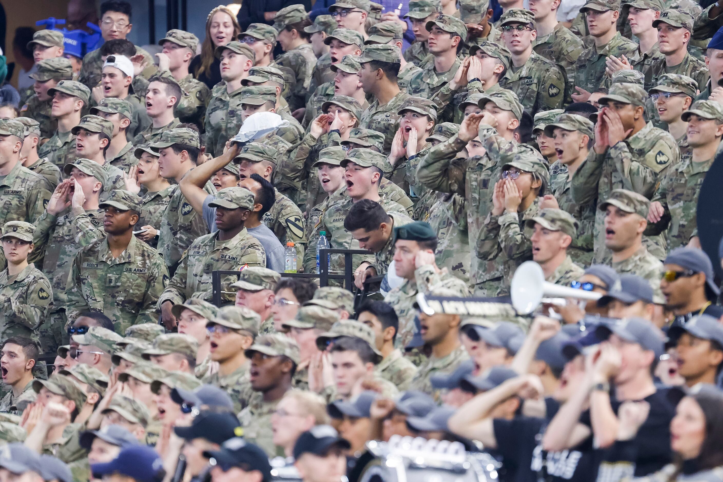 Army cadets celebrate during the fourth quarter of the 2021 Lockheed Martin Commanders’...