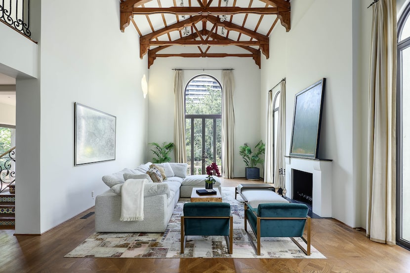 The 25-foot ceiling in the salon draws the eye up.