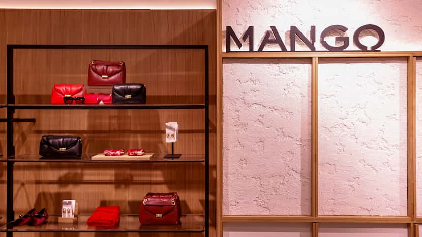 Various handbags and accessories are for sale at Mango inside Galleria Dallas,.