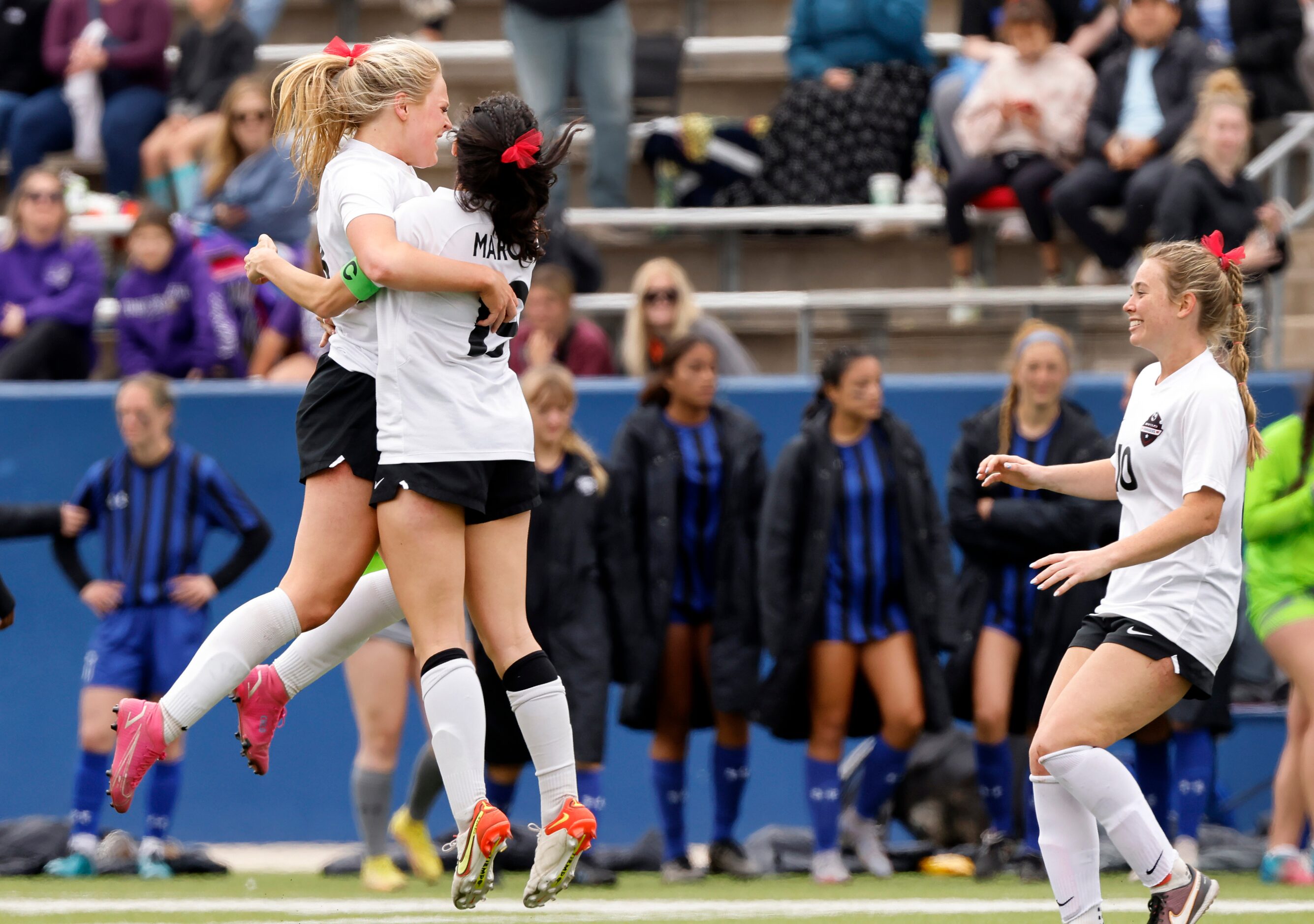 Flower Mound Marcus Chloe Adams (left) Carys Torgesen (19) and Allie Williams (right)...