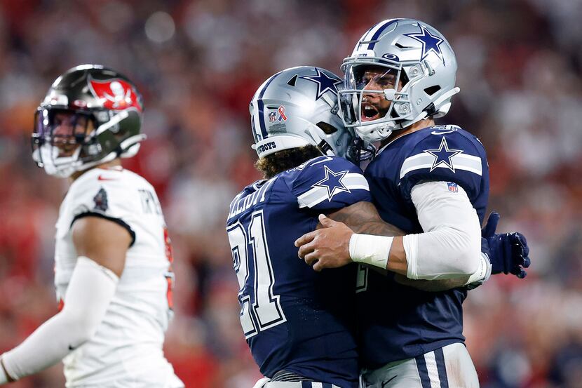 Dallas Cowboys quarterback Dak Prescott (4) and running back Ezekiel Elliott (21) celebrate...