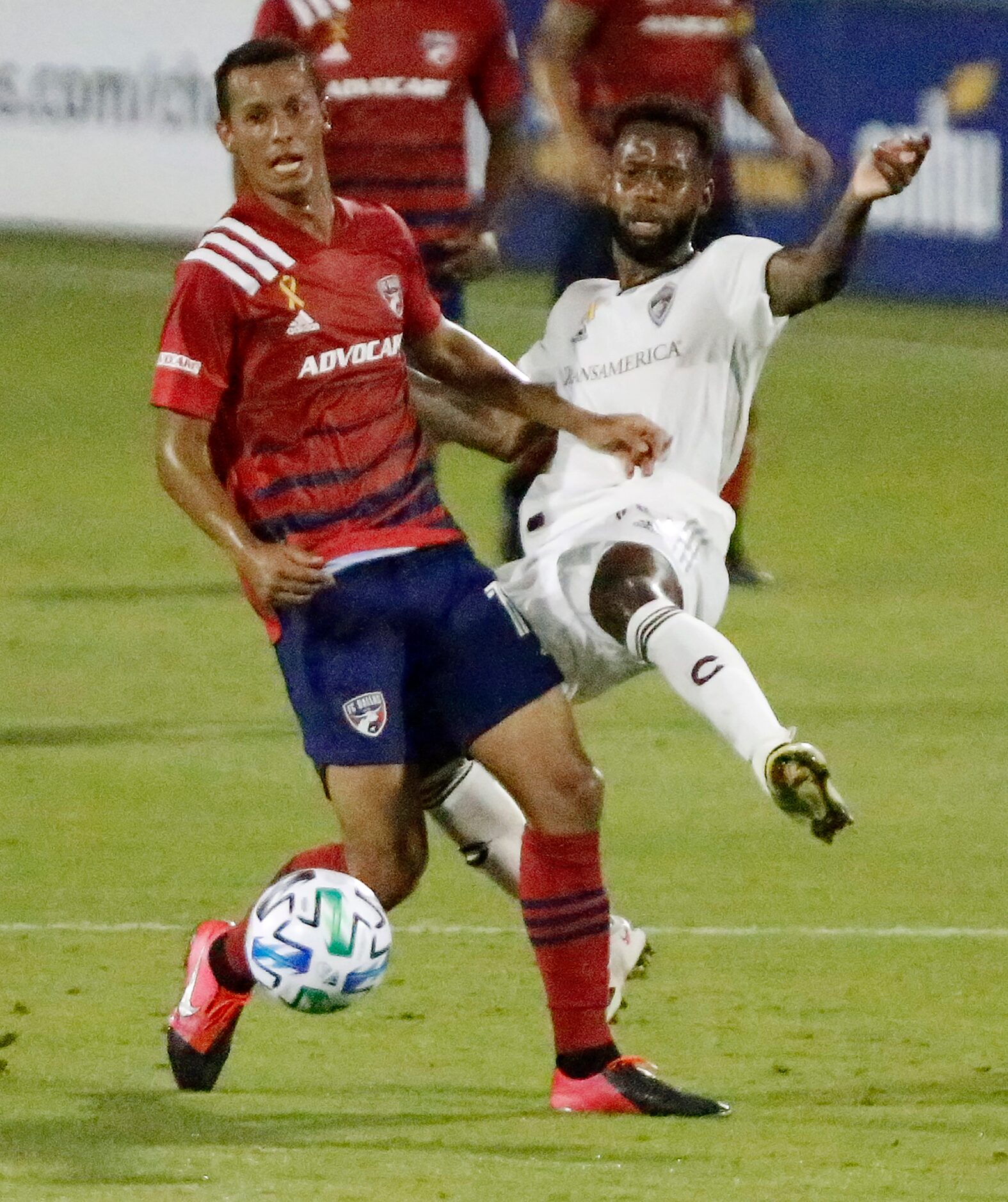 FC Dallas midfielder Pablo Aranguiz (10) and Colorado Rapids midfielder Kellyn Acosta (10)...