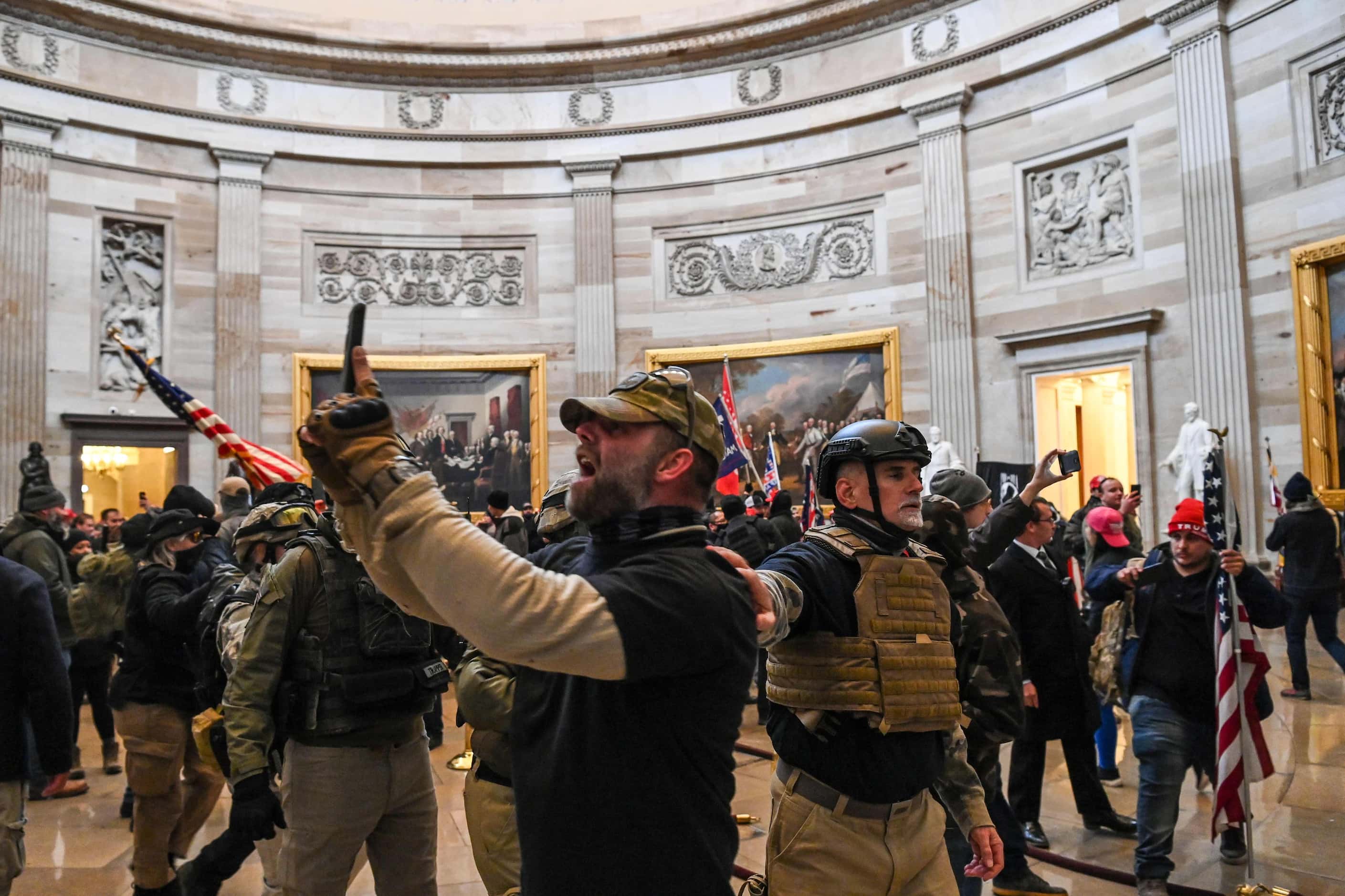 Supporters of US President Donald Trump enter the US Capitol's Rotunda on January 6, 2021,...