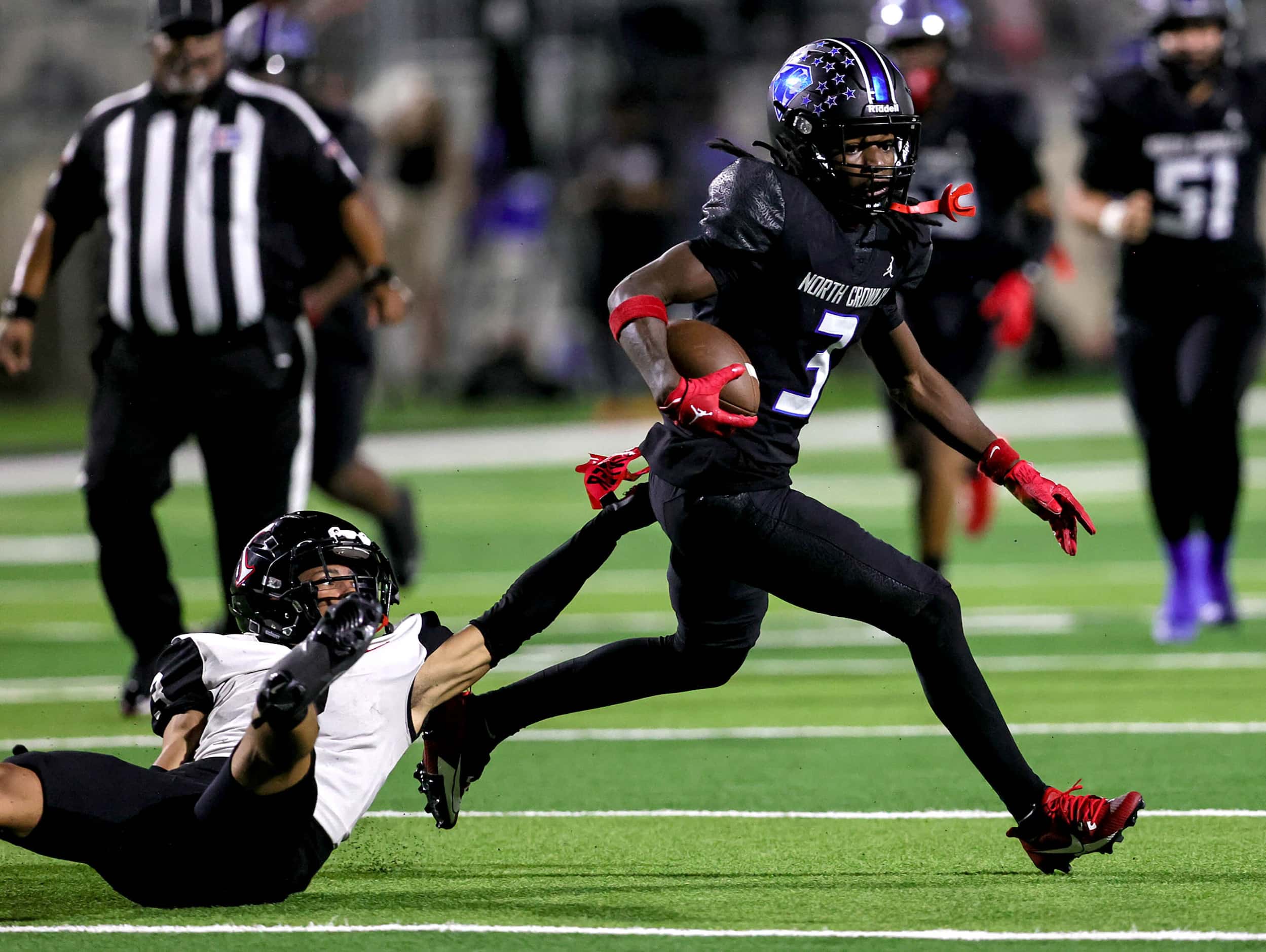 North Crowley wide receiver Dekoryian West-Davis (3) gets past Euless Trinity defensive back...