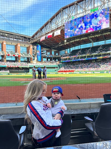 Amber Leigh Martinson and her son, Cash Beckham Martinson, enjoy the Rangers fan experience...