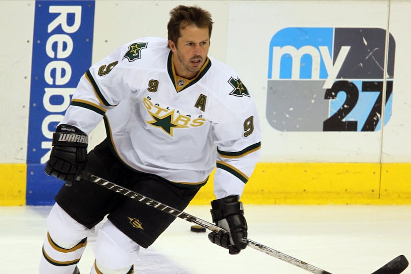 Dallas Stars center Mike Modano (9) practices before the start of NHL ice hockey action...