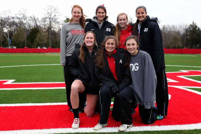 The Ursuline girls soccer team is shown during practice (Back row, from left) Catherine...