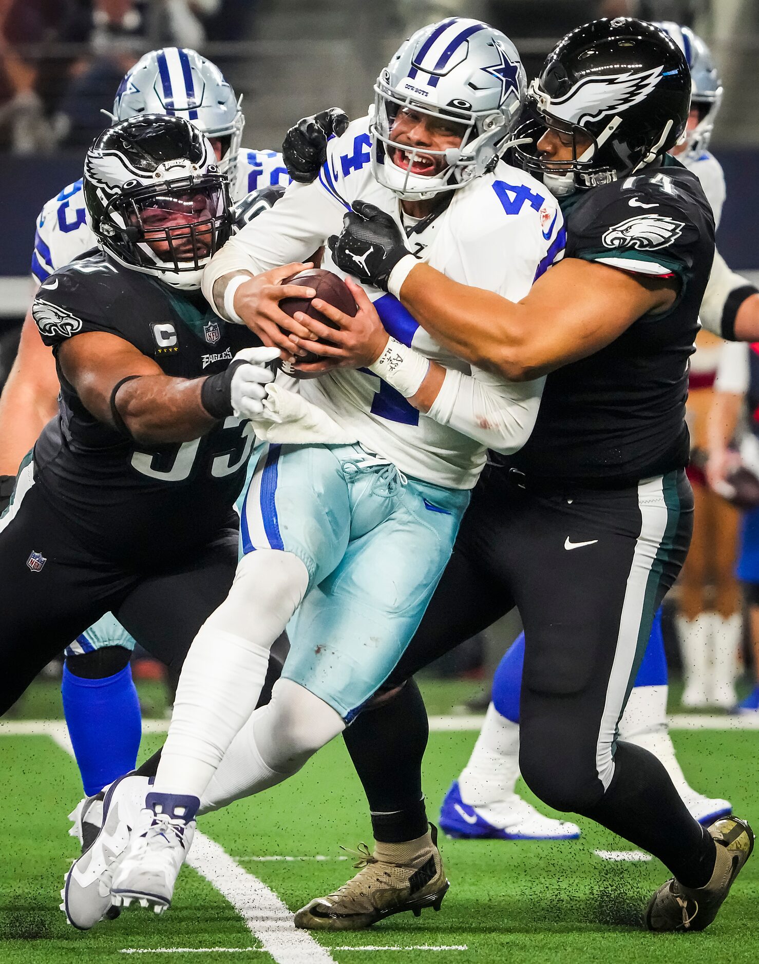 Dallas Cowboys quarterback Dak Prescott (4) is sacked by Philadelphia Eagles defensive...