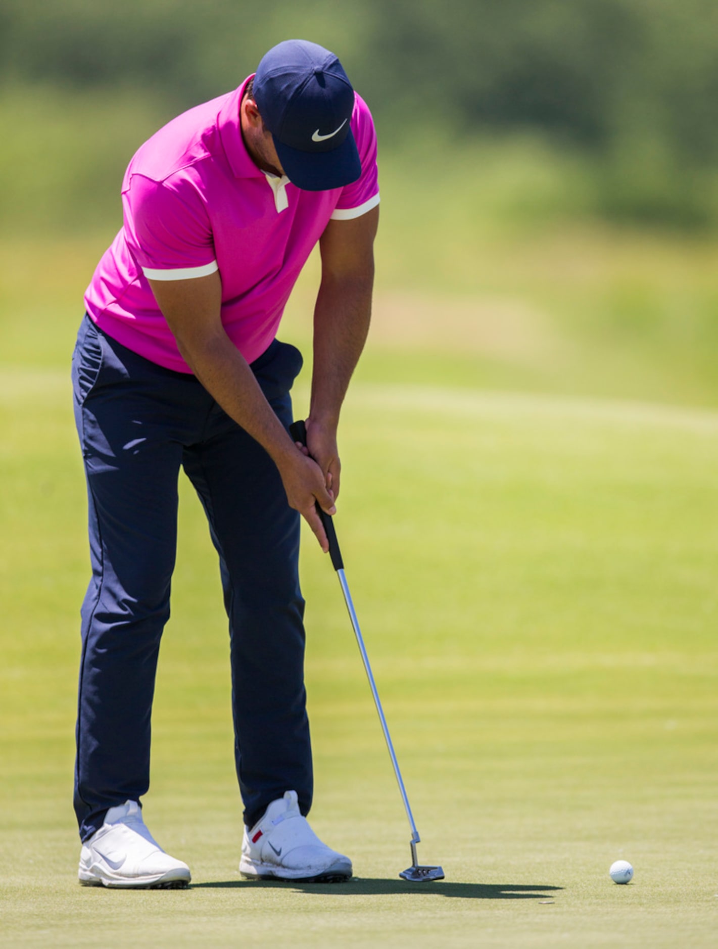 Brooks Koepka putts on third green during round 4 of the AT&T Byron Nelson golf tournament...