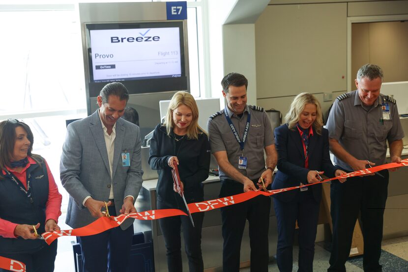 Milton De La Paz (second left), vice president of airline relations at DFW International...