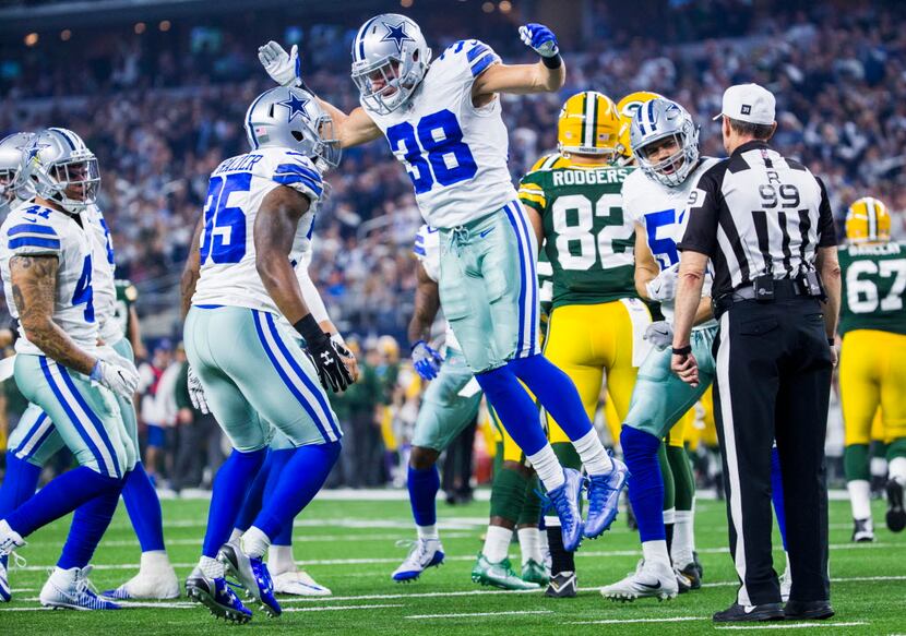 Dallas Cowboys strong safety Kavon Frazier (35) and strong safety Jeff Heath (38) celebrate...