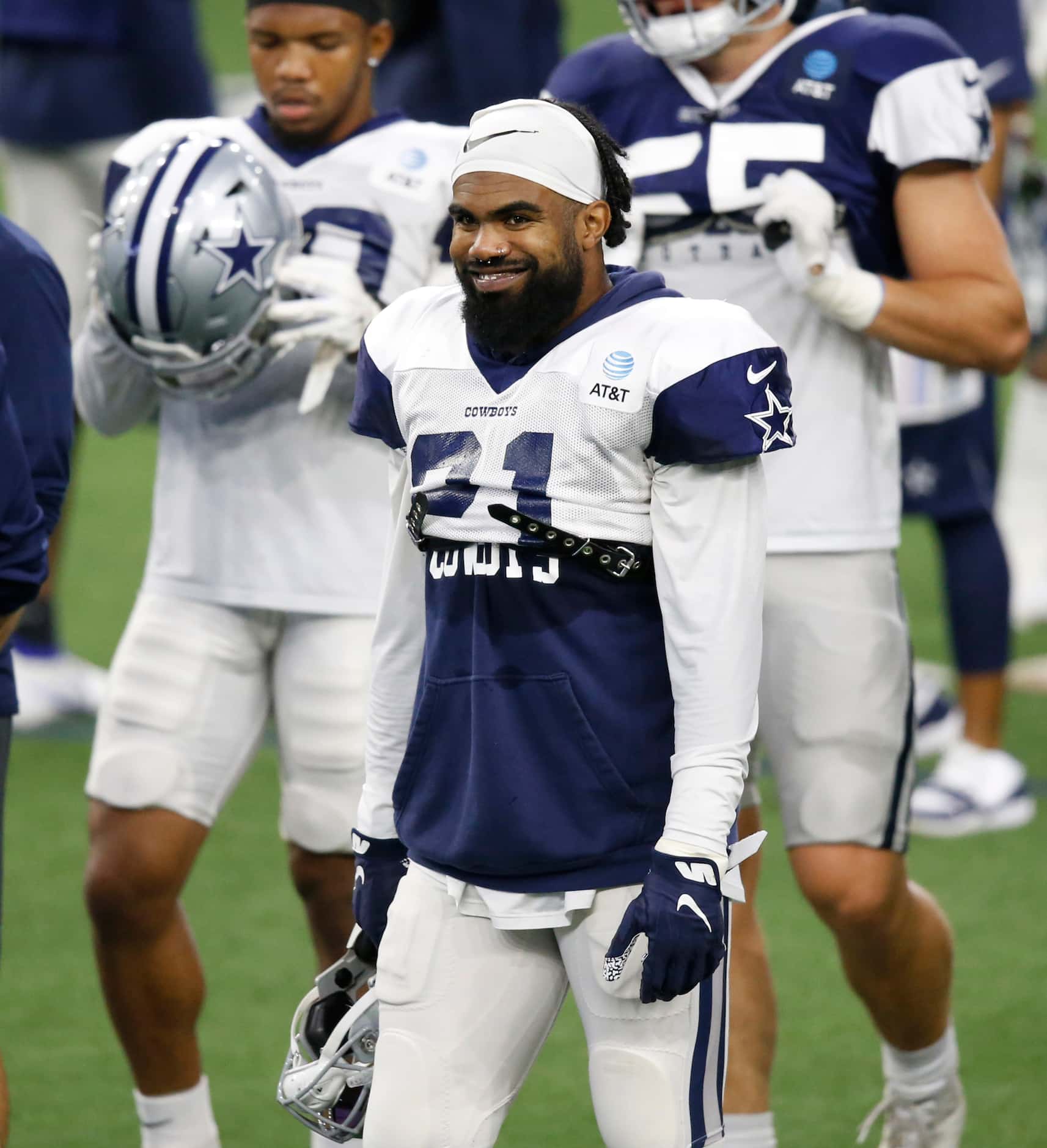 Dallas Cowboys running back Ezekiel Elliott (21) smiles during training camp at the Dallas...