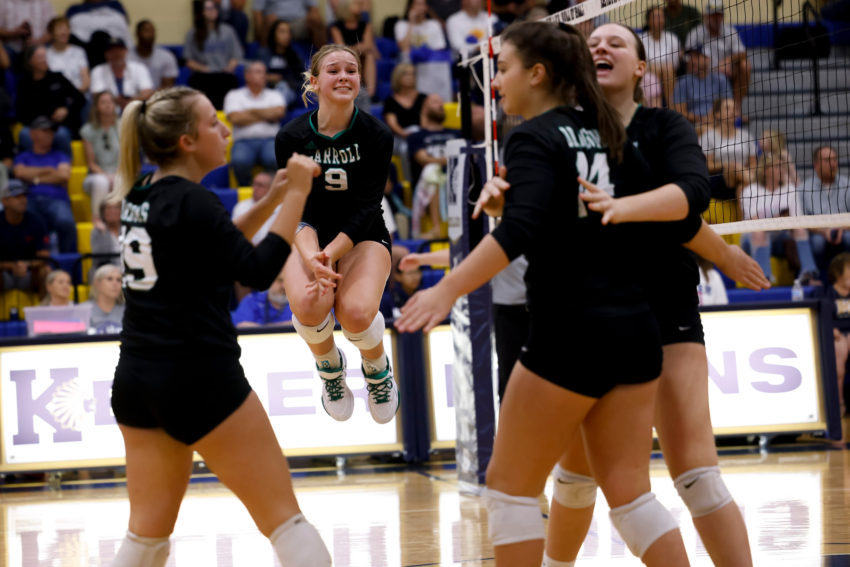 Southlake Carroll celebrates defeating Keller during the fourth and final set of a 4-6A...