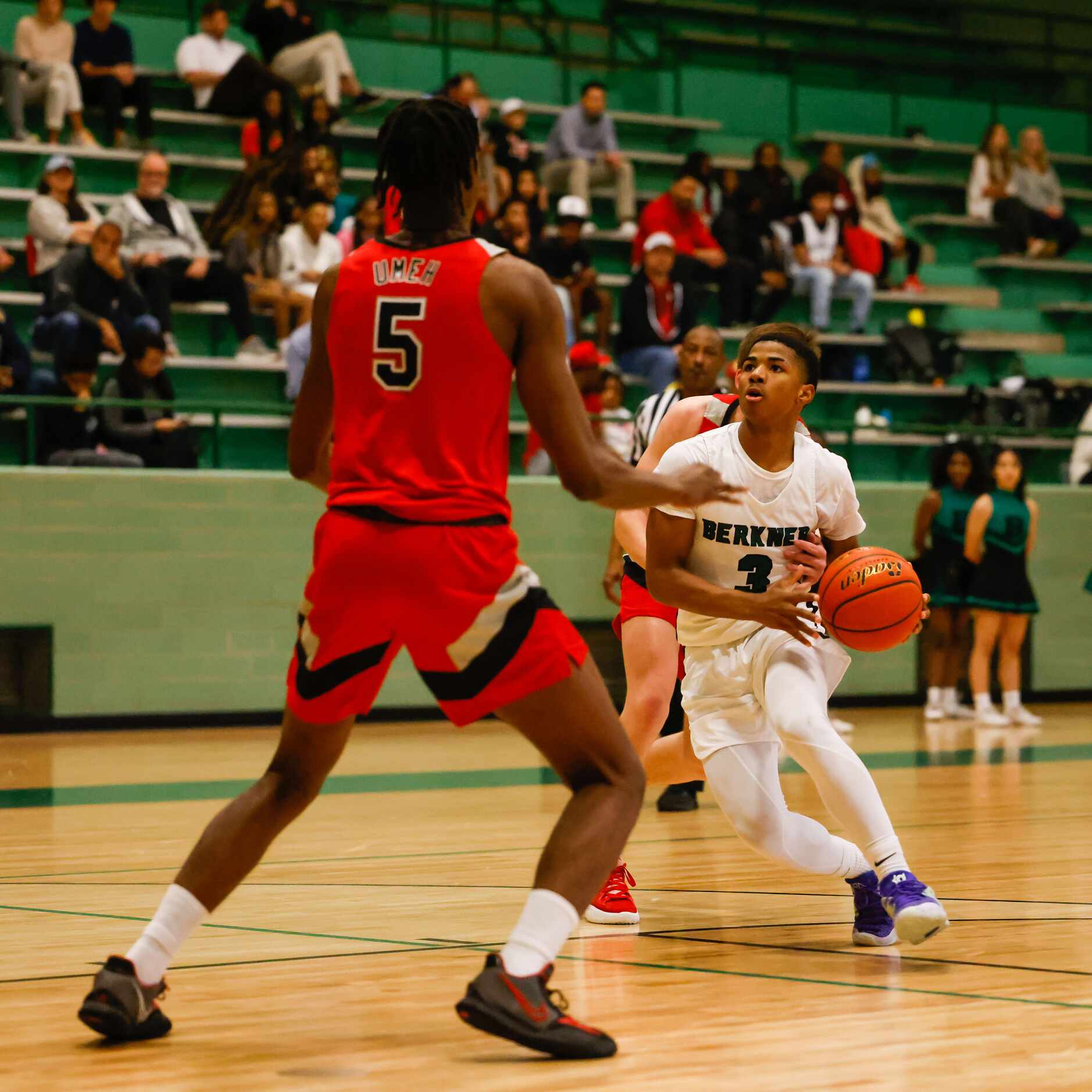 Berkner High School' Braylor Greer #3 tries to pass a block from Lake Highlands High School'...