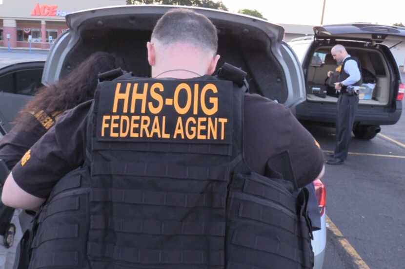 Federal agents suit up to make arrests for health care fraud as part of a nationwide sweep