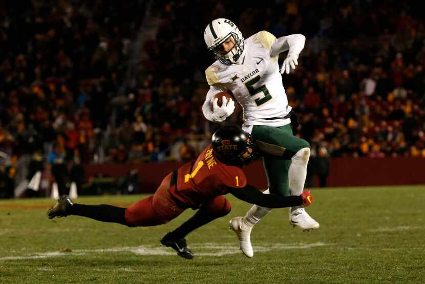 AMES, IA - NOVEMBER 10: Wide receiver Jalen Hurd #5 of the Baylor Bears is tackled by...