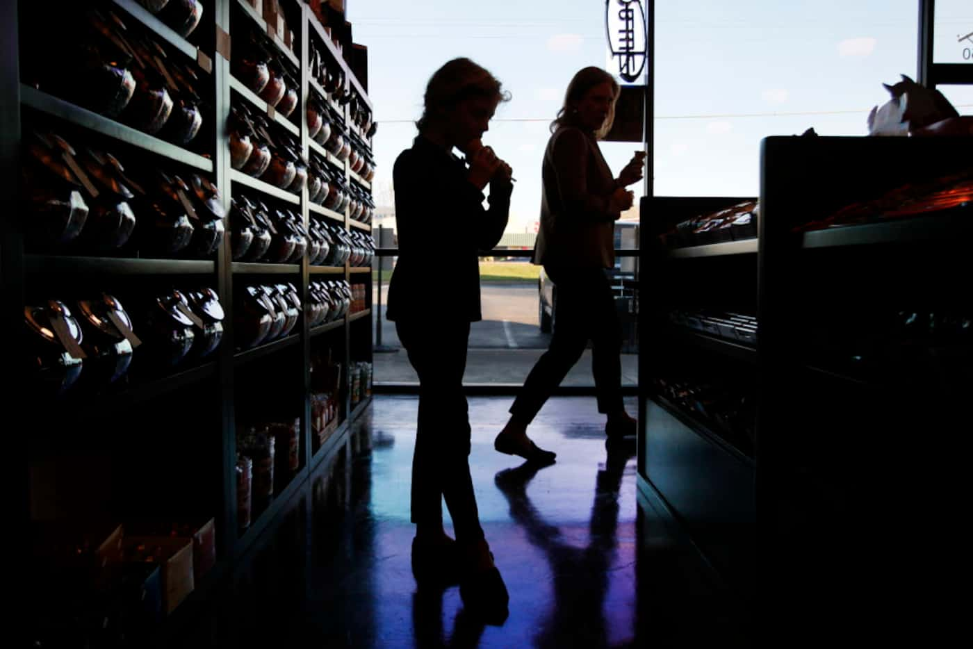 Cara Jacobson, left, and her mother Robyn Jacobson browse the candy aisle at Hypnotic...