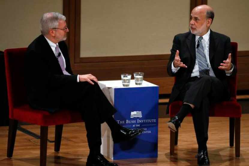 
Former Federal Reserve Chief Ben Bernanke (right) discussed monetary policy and the economy...