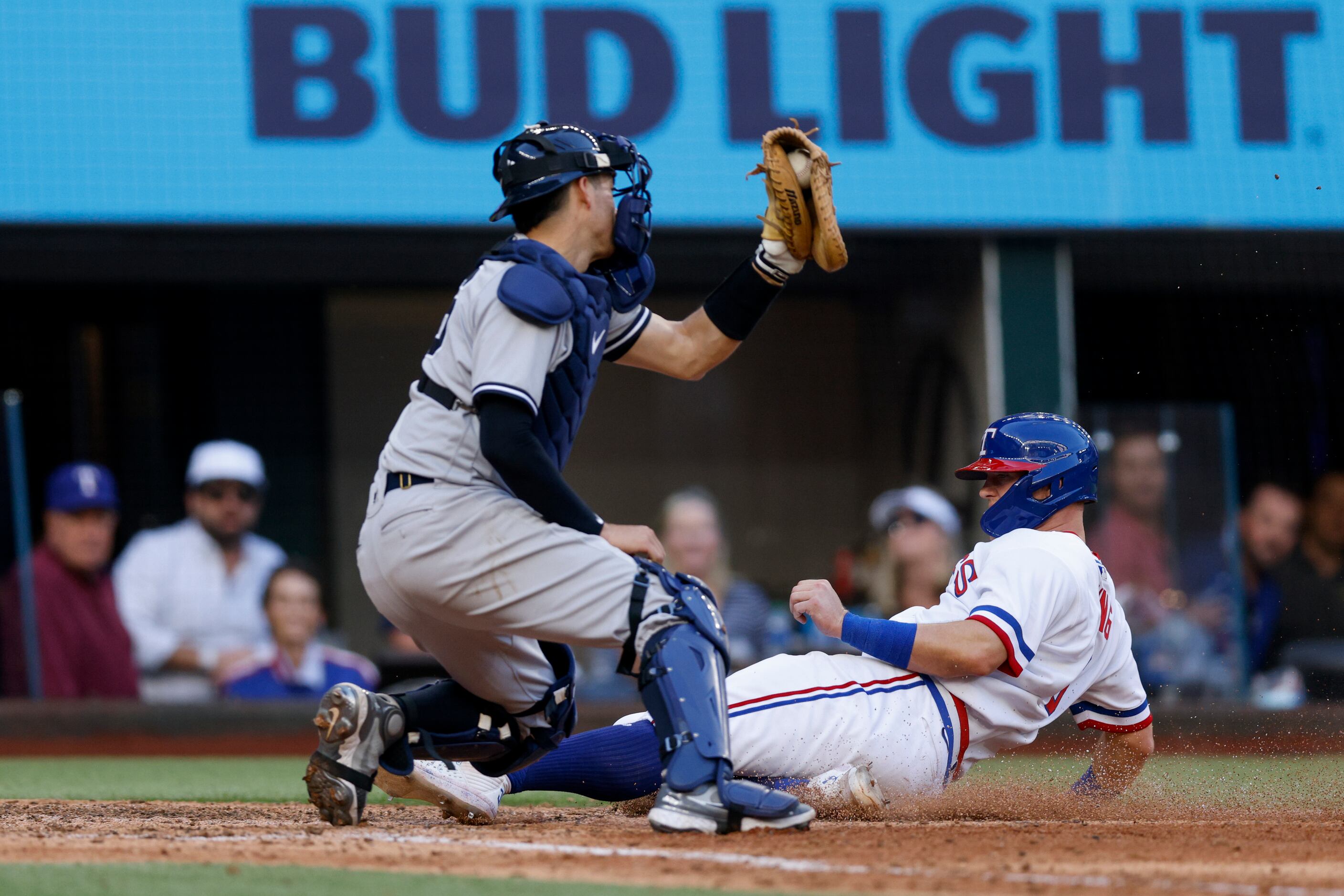 Texas Rangers third baseman Josh Jung (6) is tagged out  by New York Yankees catcher Kyle...