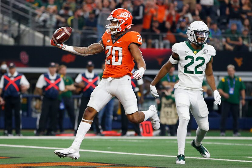 FILE - Oklahoma State running back Dominic Richardson (20) runs for a touchdown the second...