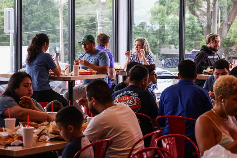 On opening day, Friday, May 28, 2021, Dave's Hot Chicken in Dallas was packed and the...