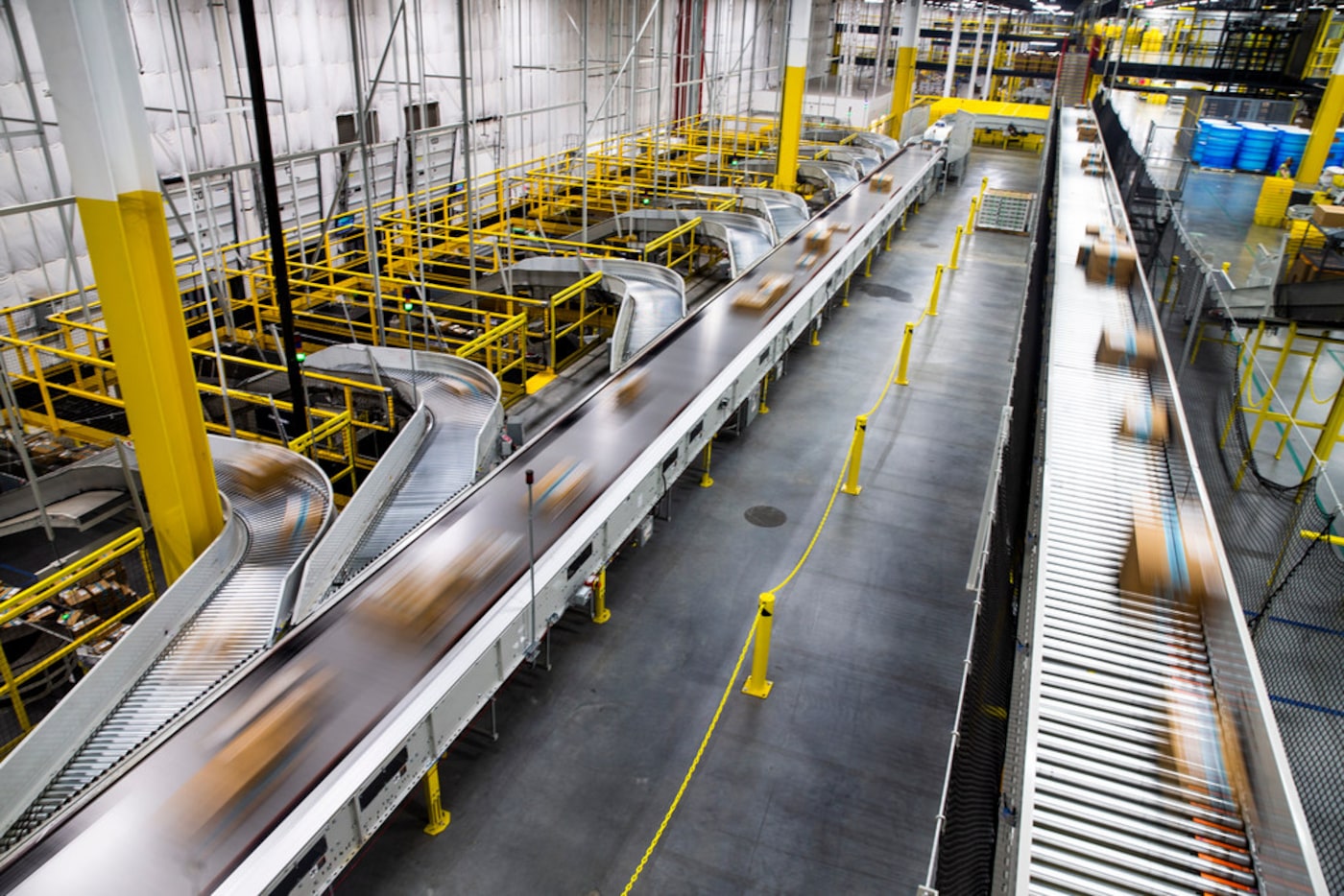 Packages move quickly along a conveyor belt in the 1-million-square-foot center.