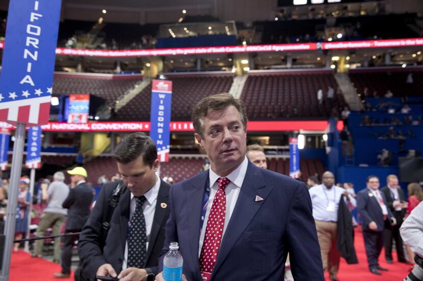 Trump Campaign Chairman Paul Manafort walks around the convention floor before the opening...