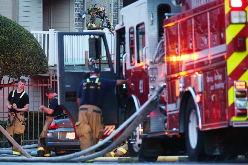 Dallas Fire-Rescue worked on putting out a fire Monday at the Landmark at Rosewood...