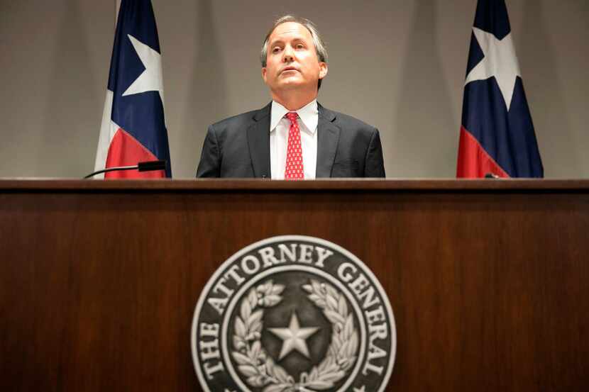 In this May 25, 2016 file photo, Republican Texas Attorney General Ken Paxton announces the...