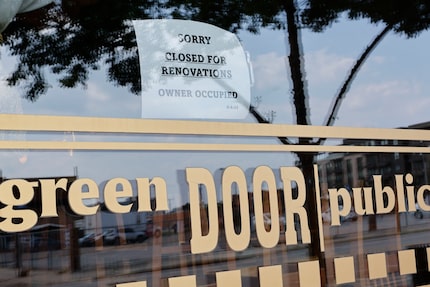 A sign on Green Door Public House says the restaurant is closed for now. The pub sold...