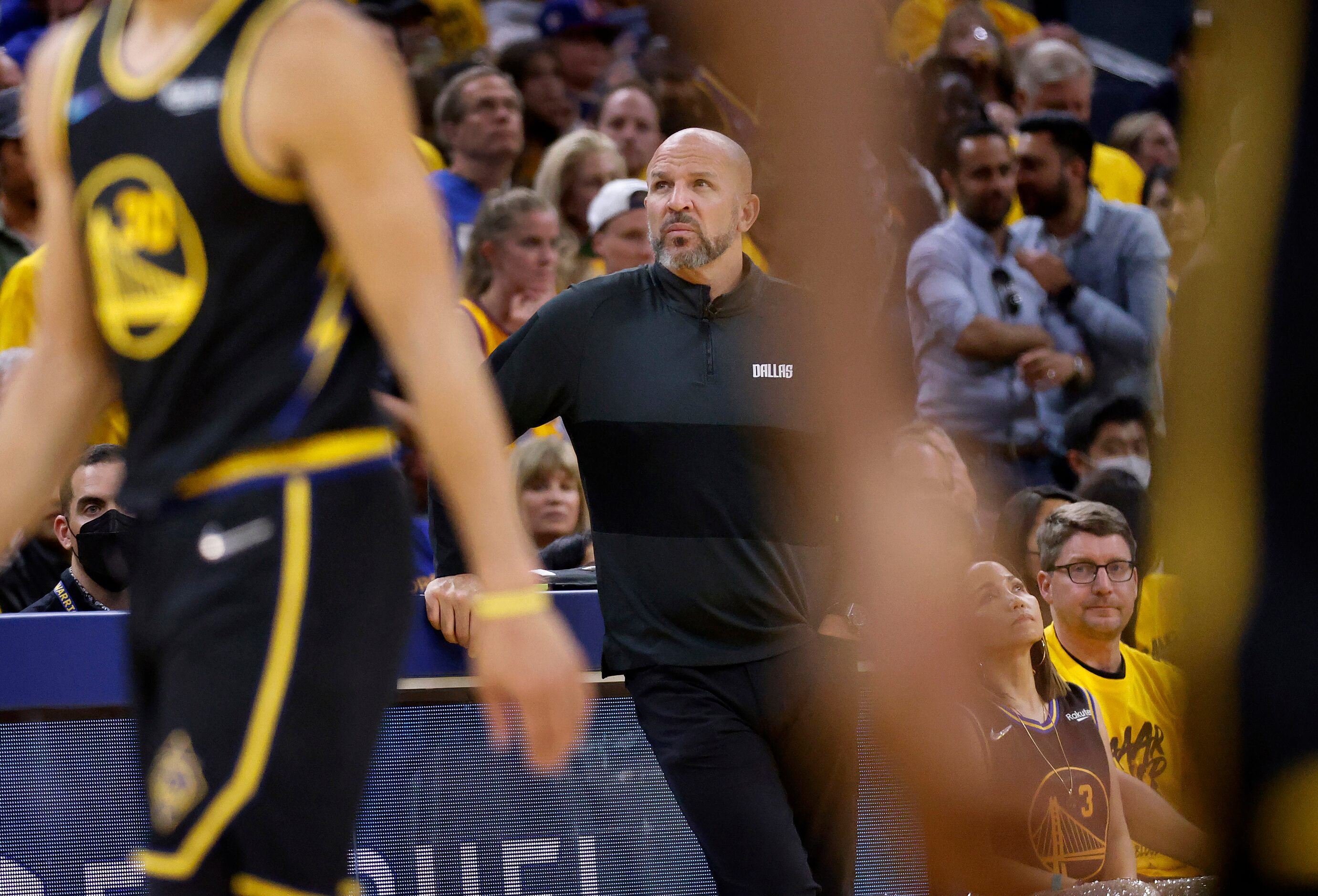 Dallas Mavericks head coach Jason Kidd looks to the scoreboard as his team trails the Golden...